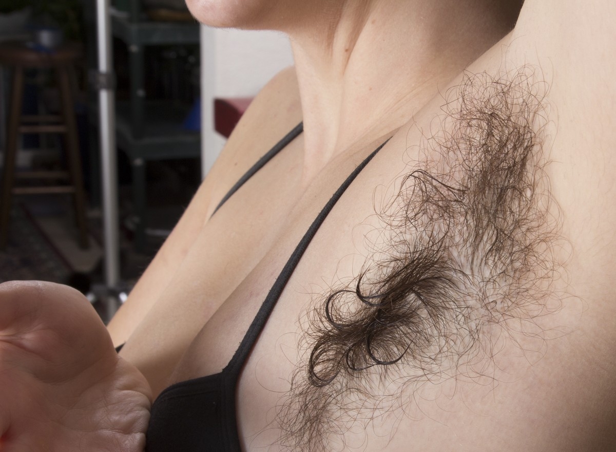 a woman named Harley showing her hairy armpit and tit