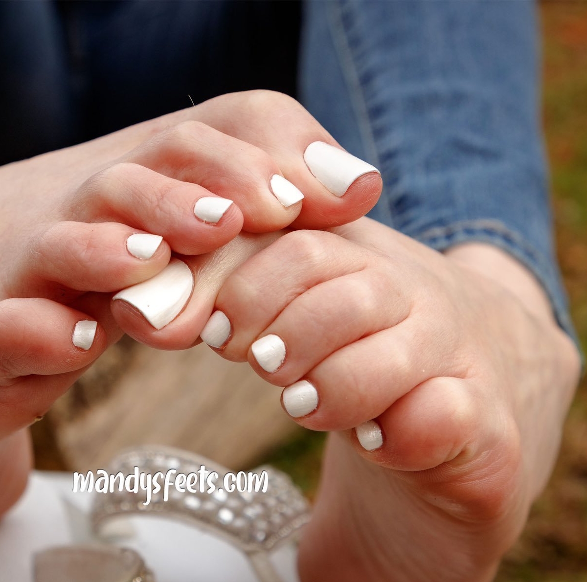 a woman named Mandy showing her toes