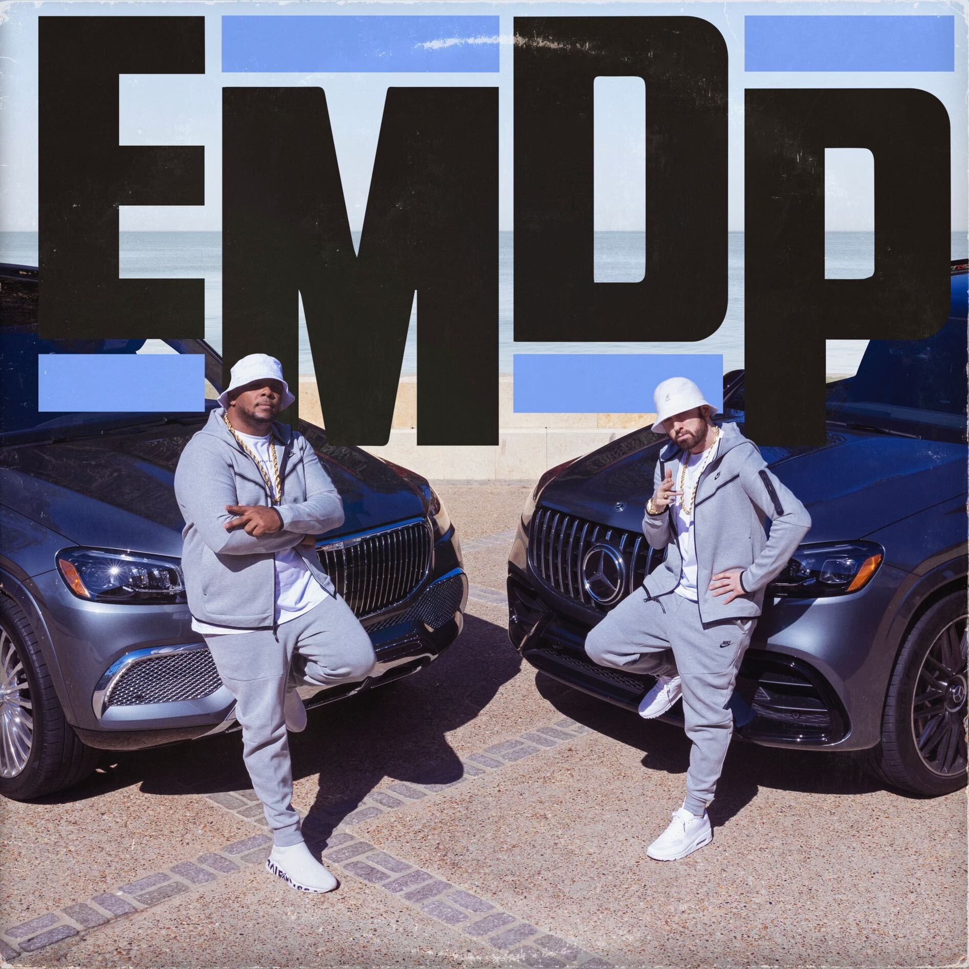 Eminem and Denaun Porter posing as EPMD