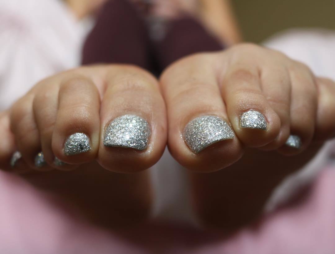 Jessica Jones showing her toes