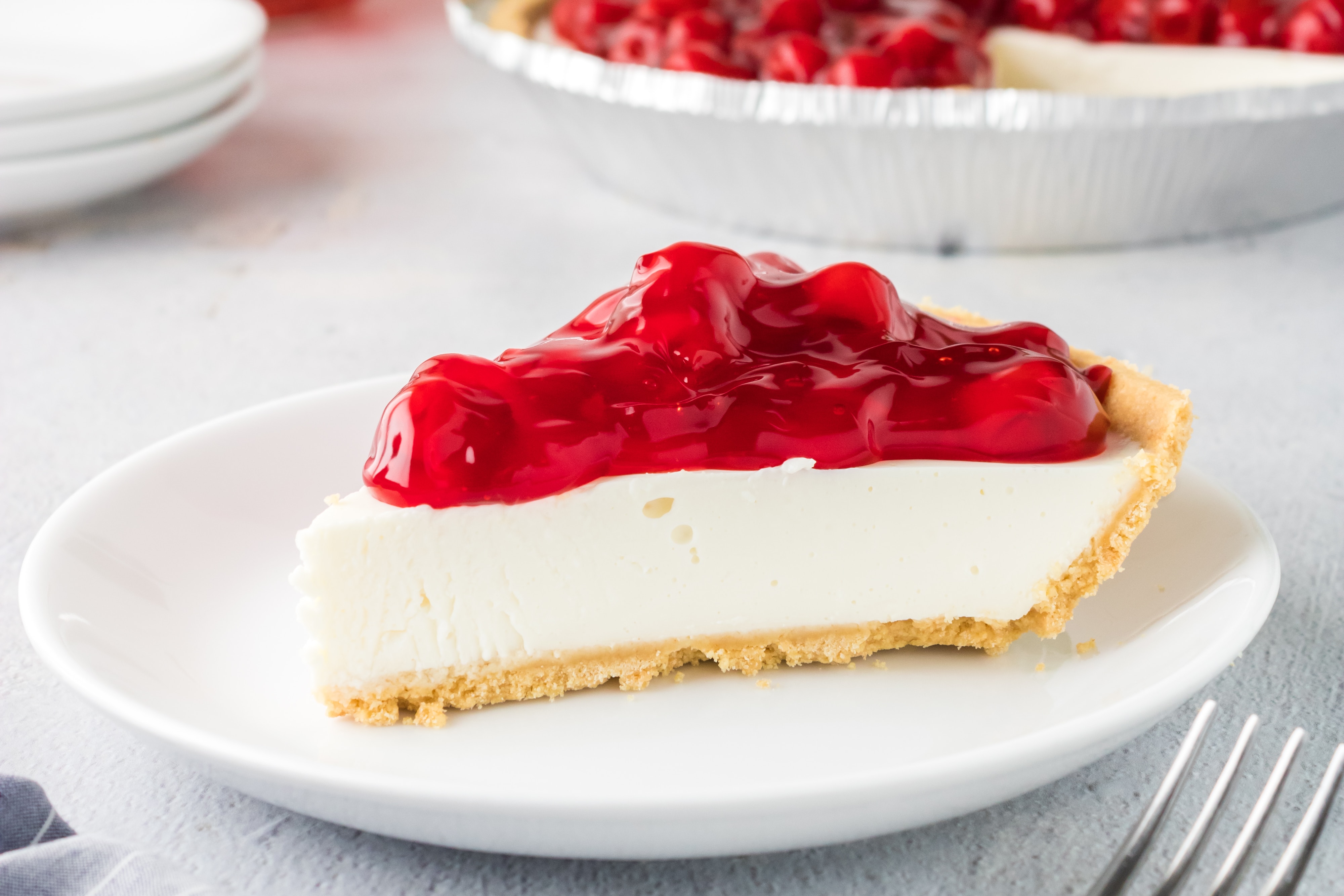 a slice of cherry cheesecake