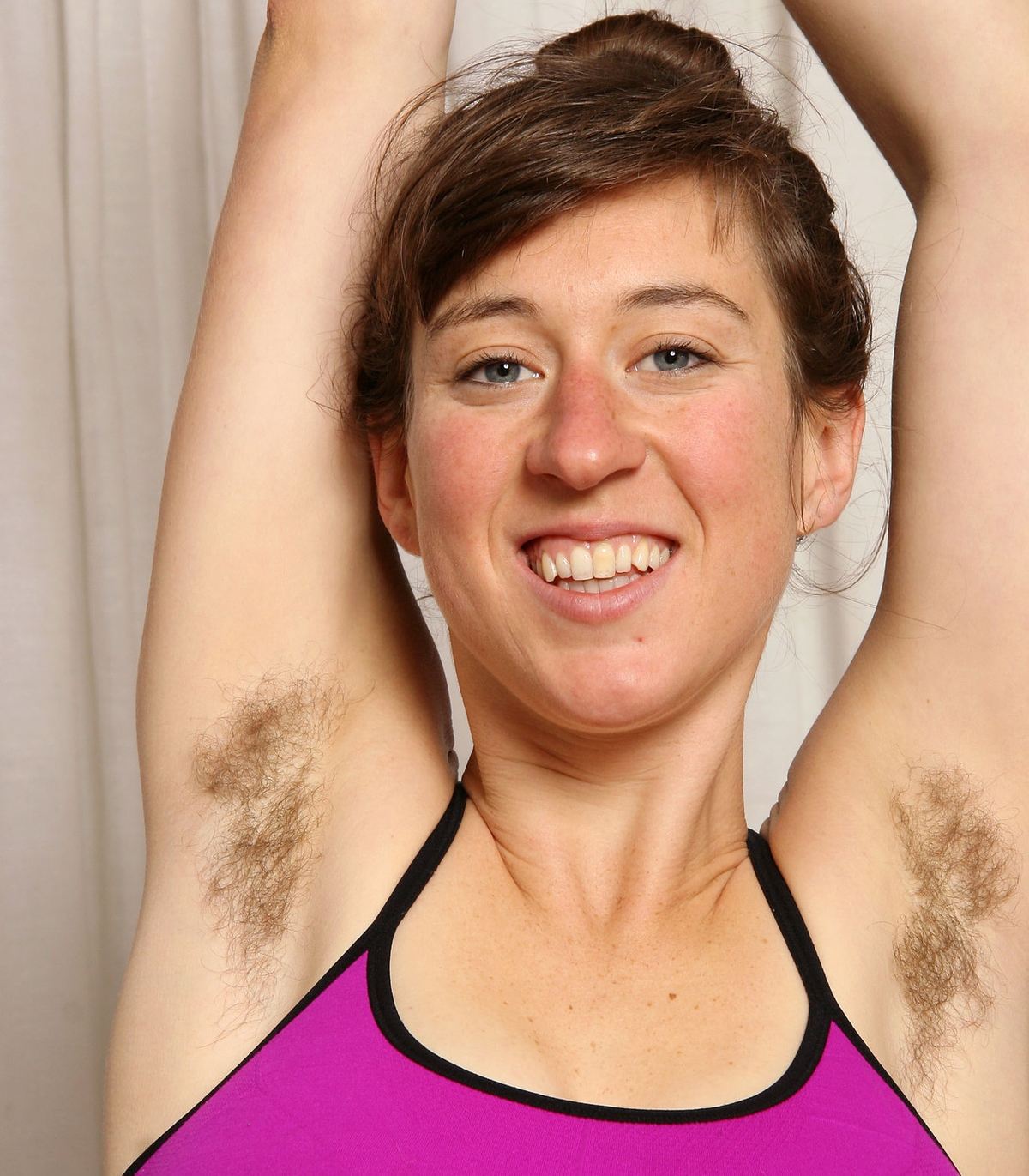 a girl named Charley showing her hairy armpits