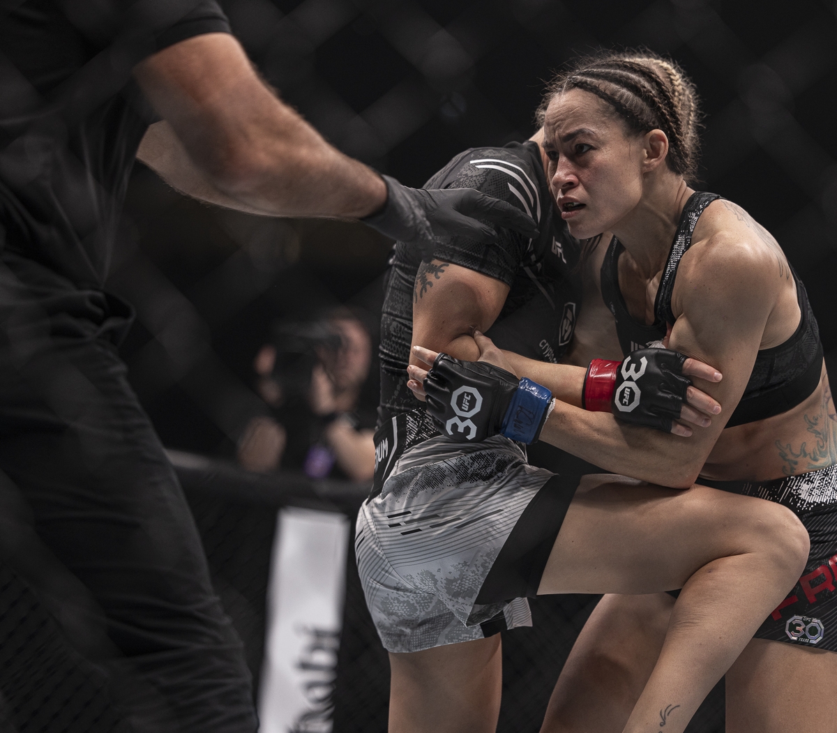 Jinh Yu Frey and Viktoriia Dudakova fighting at UFC 294