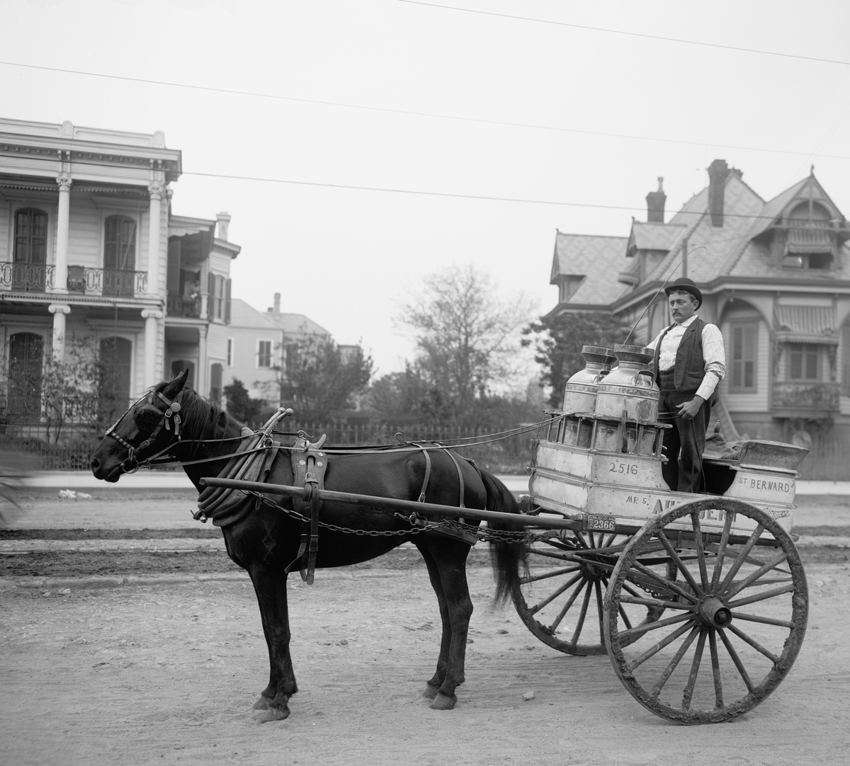a milkman on a horse cart