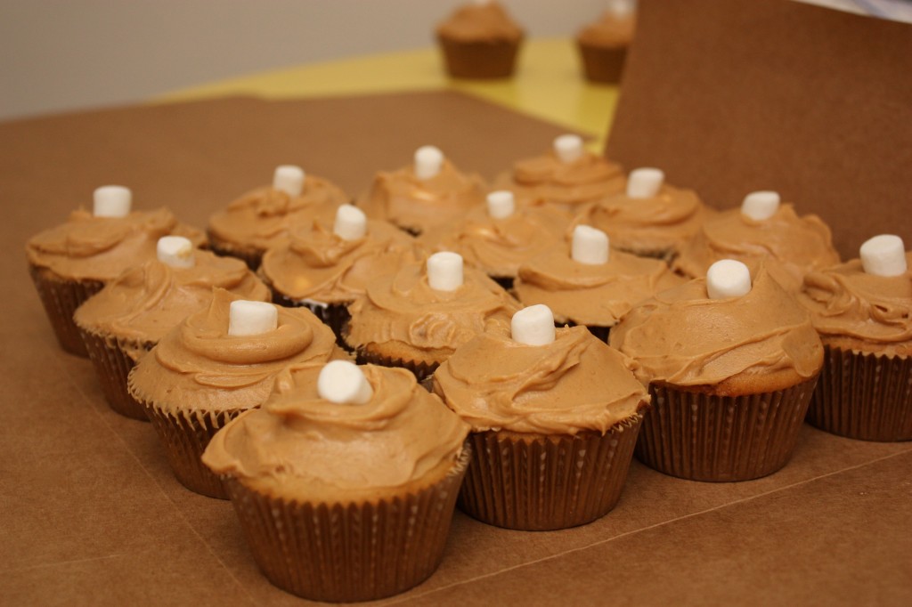 peanut butter cupcakes with marshmallows on top