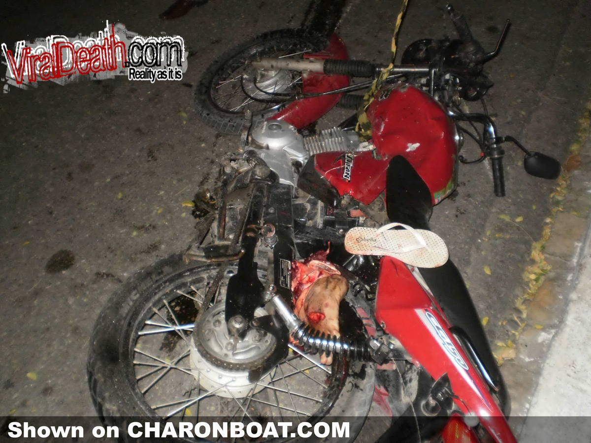 a girl lying dead after a motorcycle accident