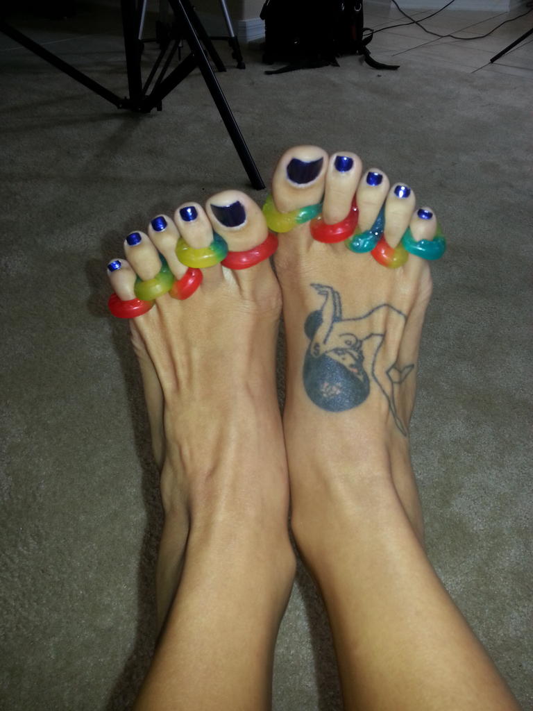 Danica Logan showing candy on her toes