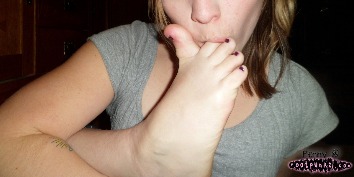 a girl named Penny sucking her toe