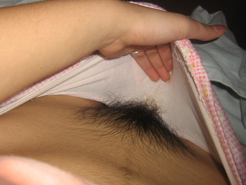 a girl showing her pussy hair