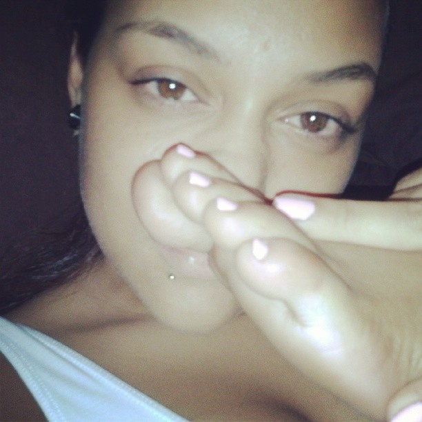 a girl named Ceejay sniffing her feet