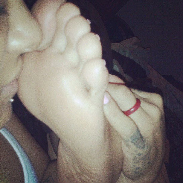 a girl named Ceejay sniffing her feet