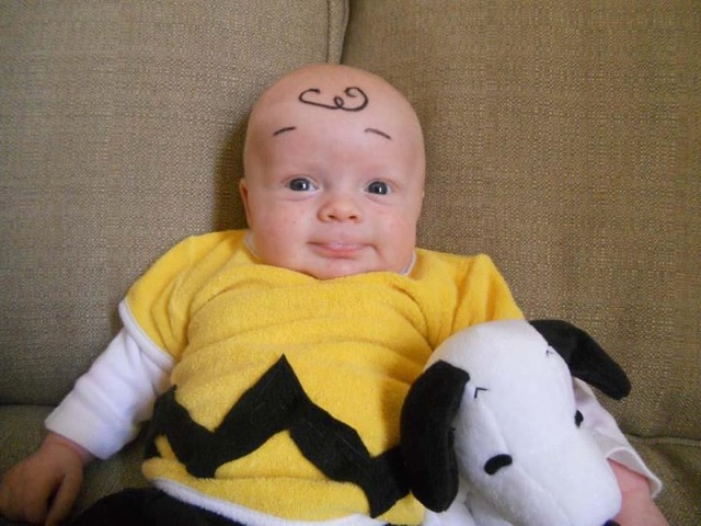 a baby dressed like Charlie Brown