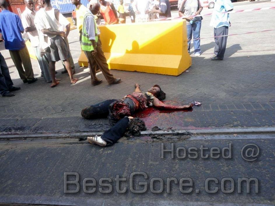 a woman lying on a track after being ran over by a train