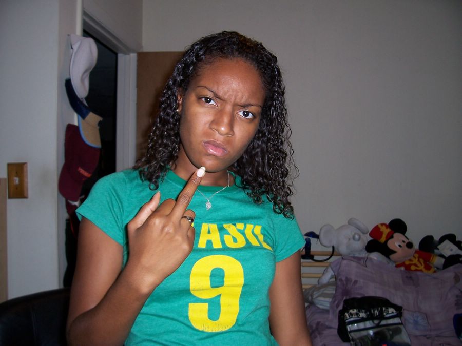 a girl with her middle finger up