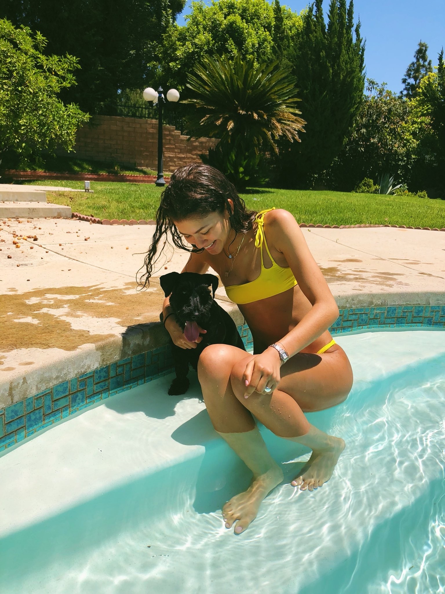 Zendaya posing with her dog