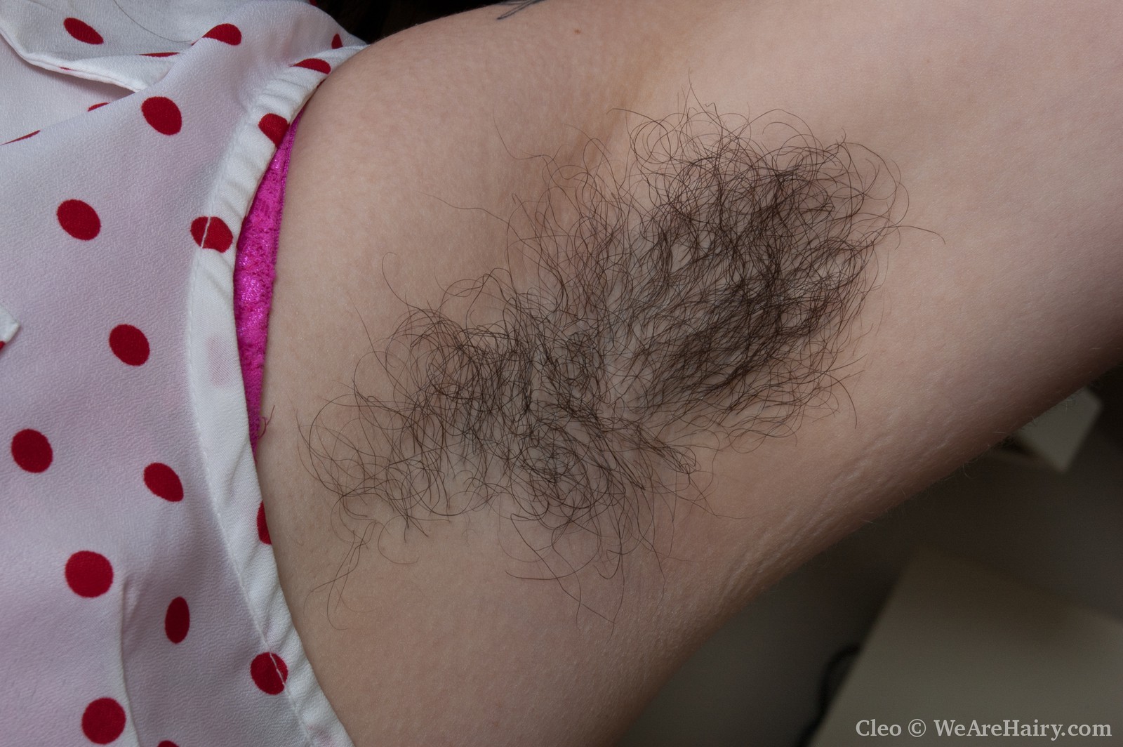 a girl named Cleo showing her armpit hair