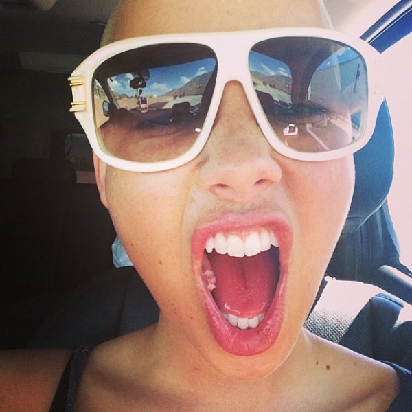 Amber Rose showing the inside of her mouth