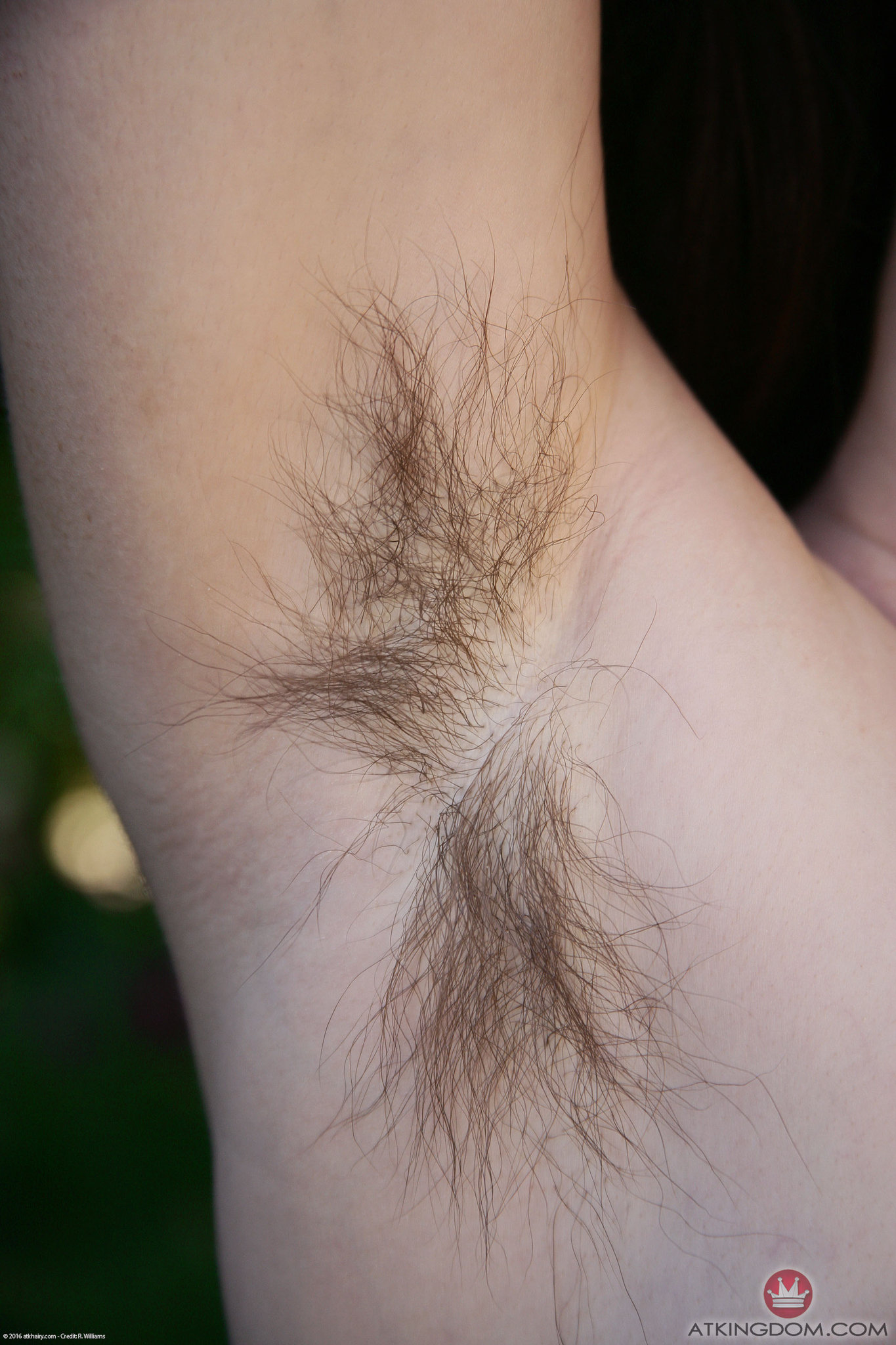 a woman named Snow showing her armpit hair