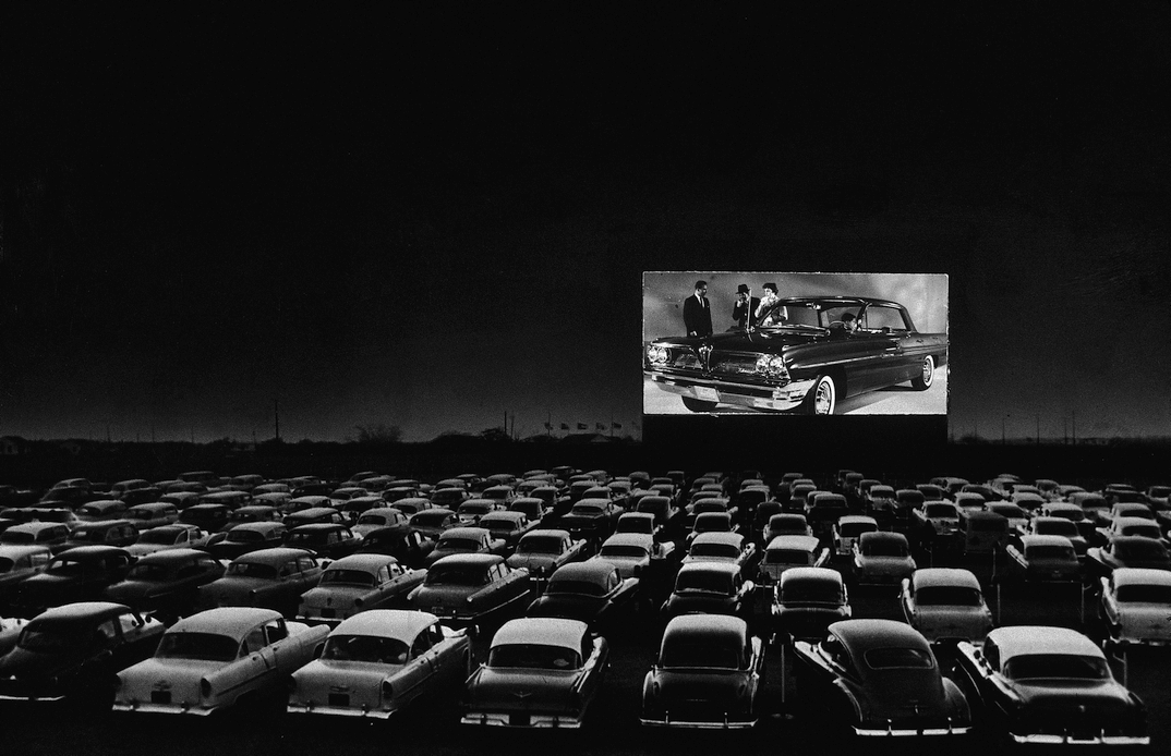cars at a drive-in movie theater