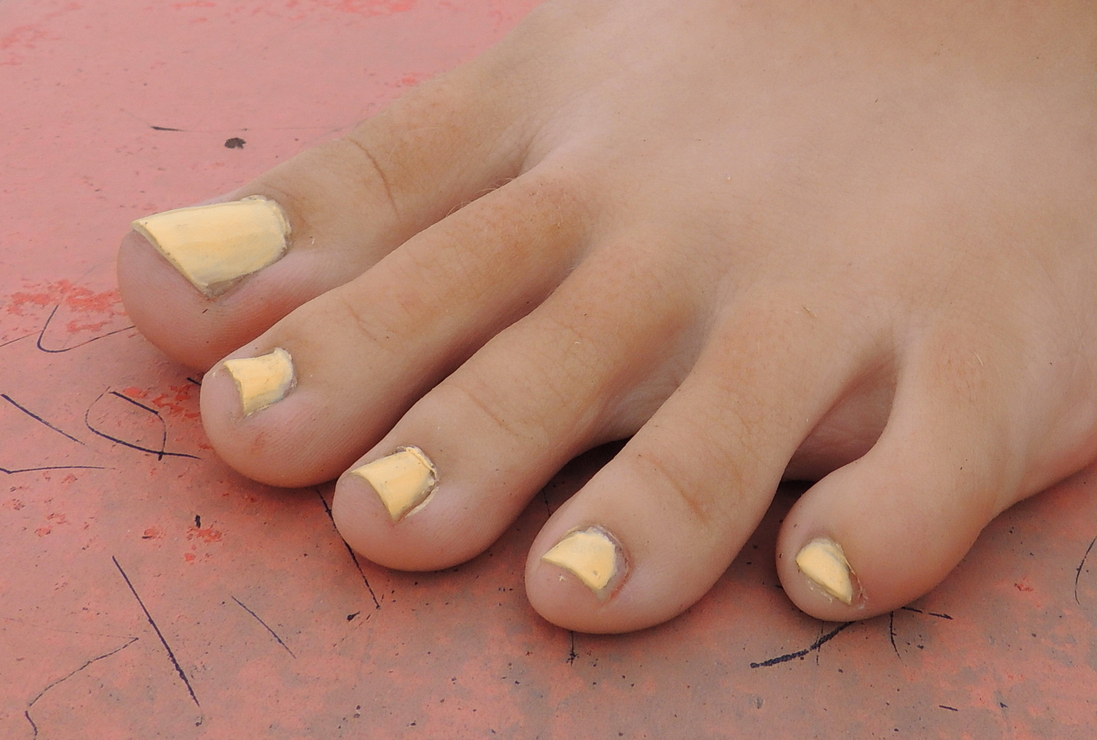 a girl named Stacy showing her toes
