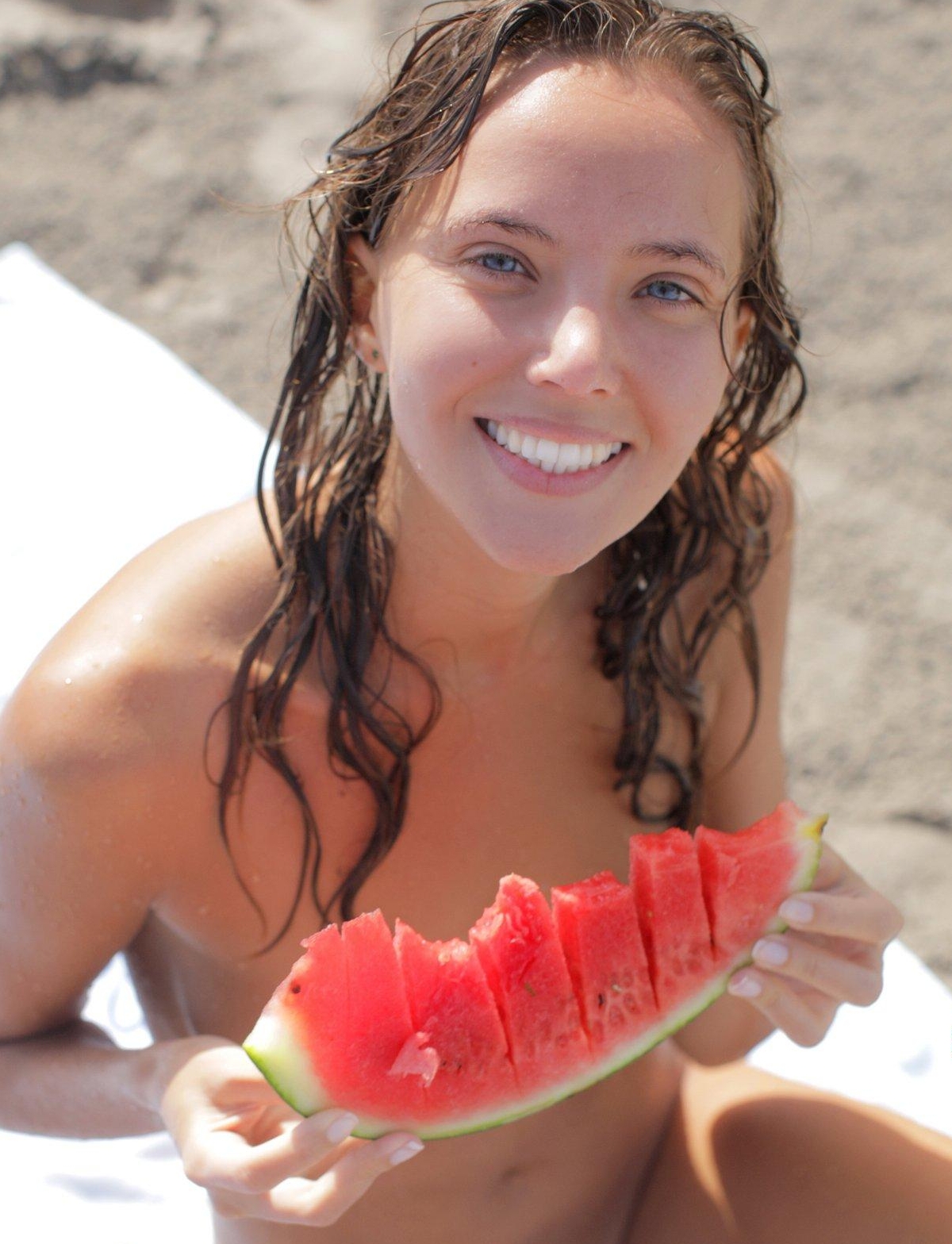 Katya Clover posing with a watermelon
